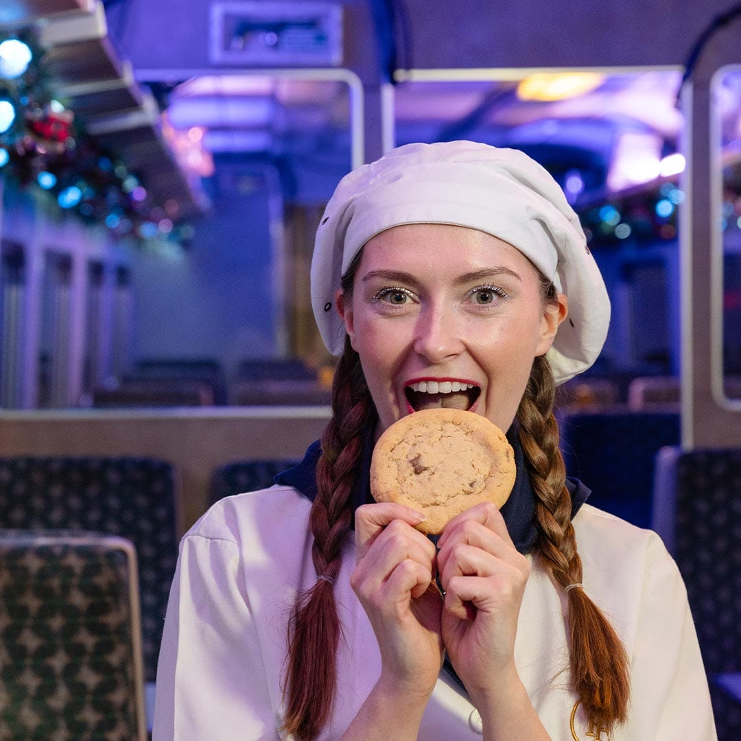 chef eating cookie on board THE POLAR EXPRESS train ride