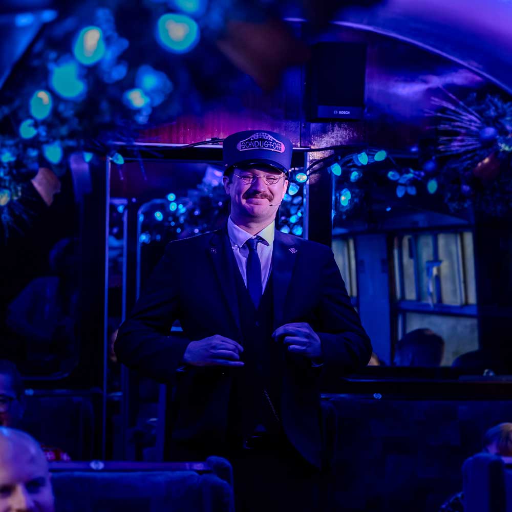 conductor on board the polar express train ride